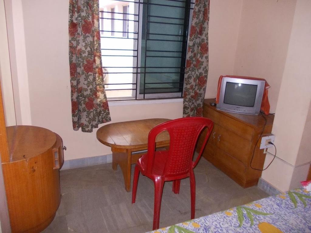 Rishaan Guest House Puri Bilik gambar